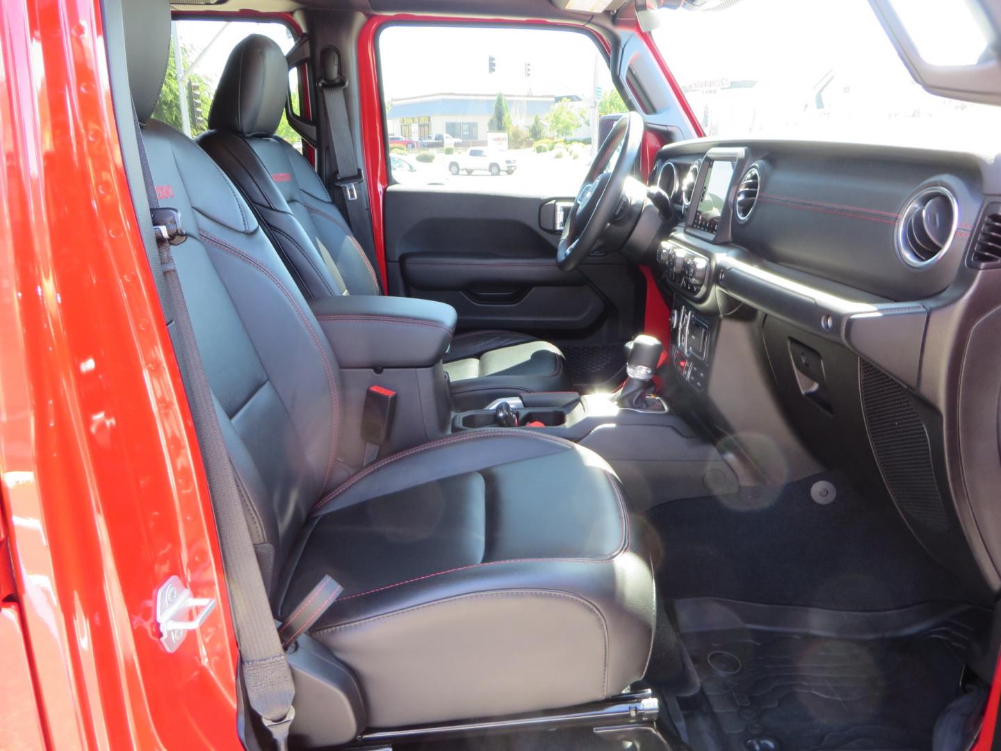 2020 Red /black Jeep Gladiator Rubicon (1C6JJTBG6LL) with an 3.6L V6 DOHC 24V engine, 6M transmission, located at 2630 Grass Valley Highway, Auburn, CA, 95603, (530) 508-5100, 38.937893, -121.095482 - Rubicon Gladiator featuring a Mopar suspension system with Fox shocks, 17" AEV wheels wrapped in 37" BFG tires, Warn Winch, Rock sliders, Cascade front license plate holder, Impact bedliner, Built Right Industries bed Molle panels, and Window tint. - Photo#50